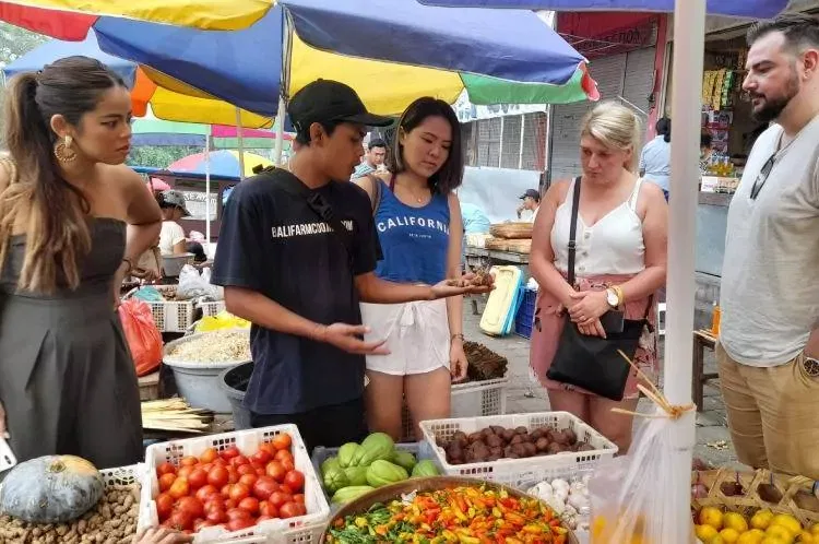 Chef Beego taking customers to local market tours