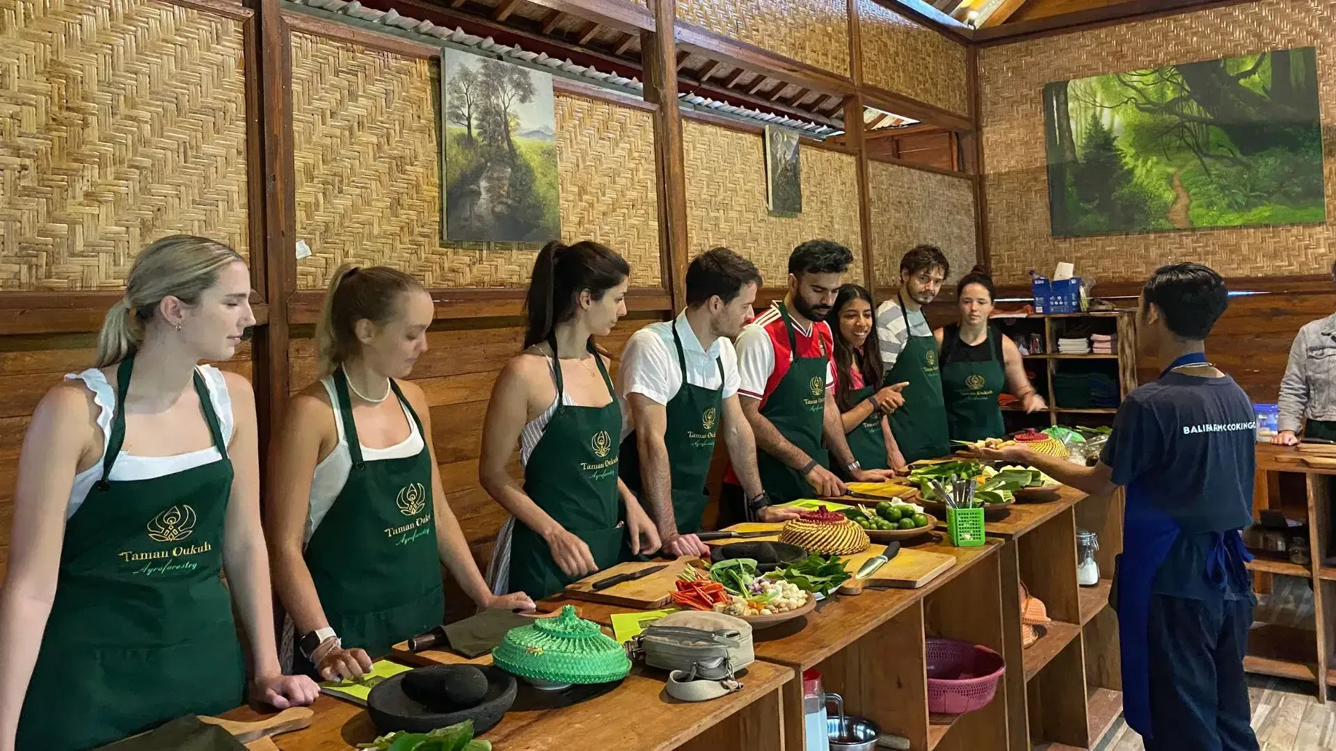 Guests enjoying an Afternoon Bali Cooking Class in Ubud's Organic Farm