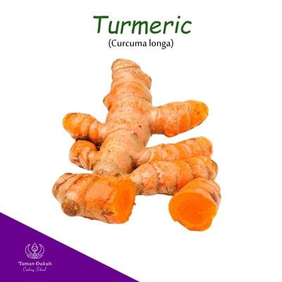 Vibrant fresh turmeric root (kunyit), a key Balinese spice.