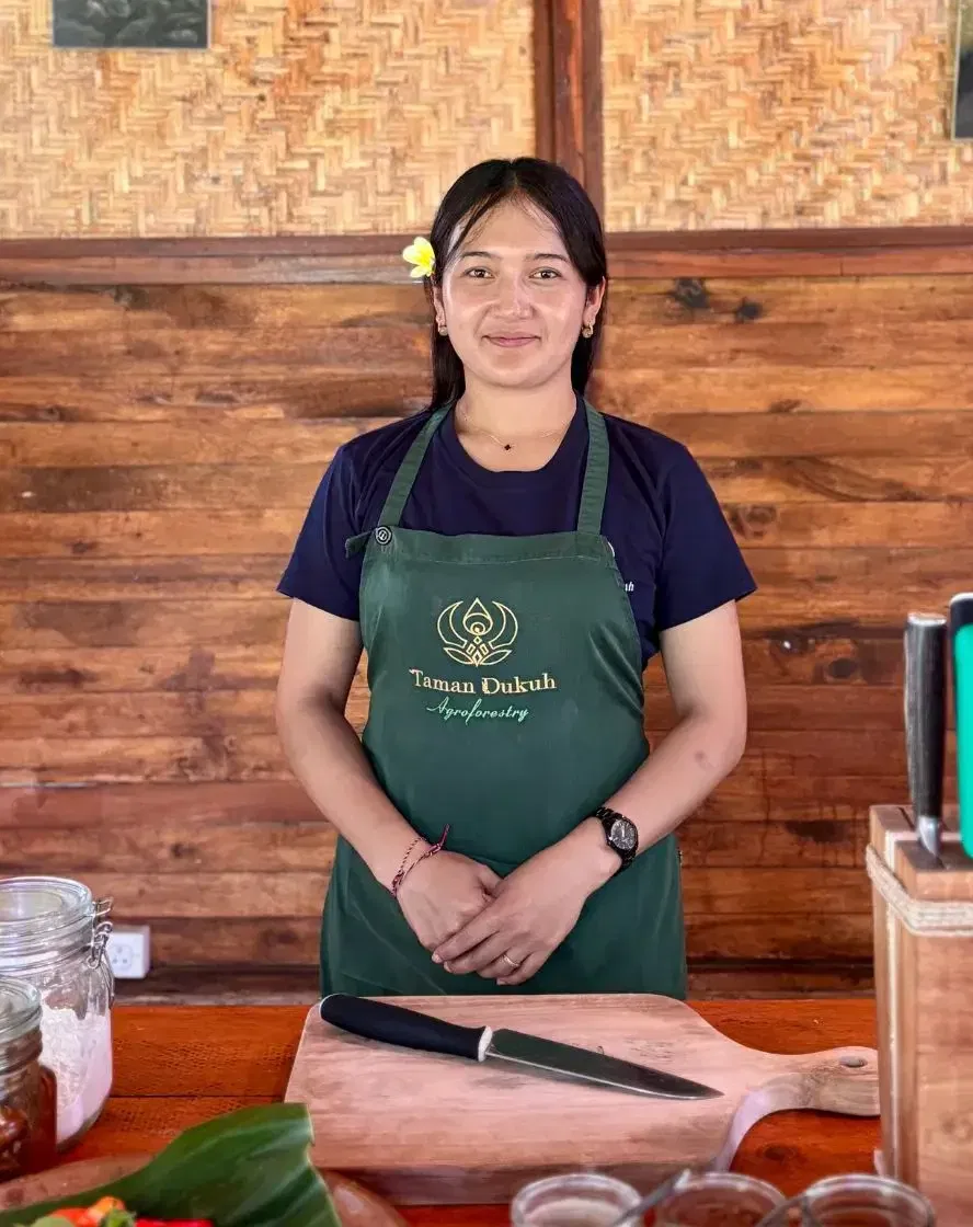 Ketut Fira, expert Balinese cooking instructor blending tradition and pro training at Taman Dukuh, Ubud