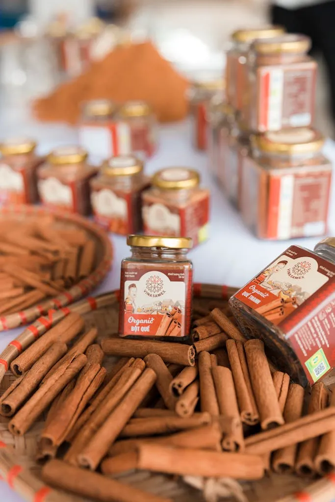 Kayu Manis - Cinnamon 2 cinnamon sticks and jars in a market
