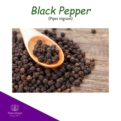 Spices & Ingredients 8 Whole dried black peppercorns (merica hitam) displaying their dark, wrinkled appearance, a common Balinese spice.