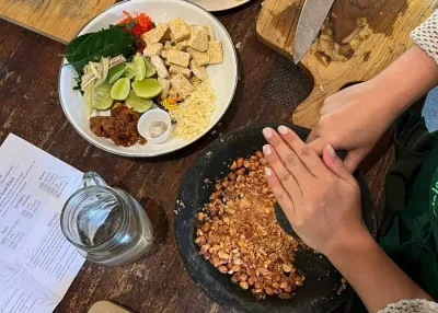 Five Reasons to Try a Cooking Class in Bali 1 traditional way to make peanut sauce